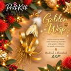 Christmas Cat Gift featuring Golden Wisp teaser with feathers and ribbons, handmade in Queensland.