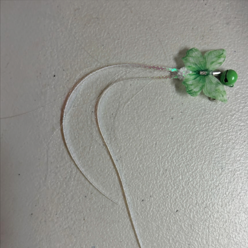 Aussie Bush Cat Toy - Shimmer Bug featuring delicate green butterfly wings and shimmering tails.