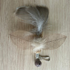 brown moth with leafy wings