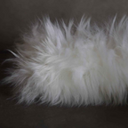 Soft and fluffy texture of the premium Dog Tug Toy made from Australian sheepskin.
